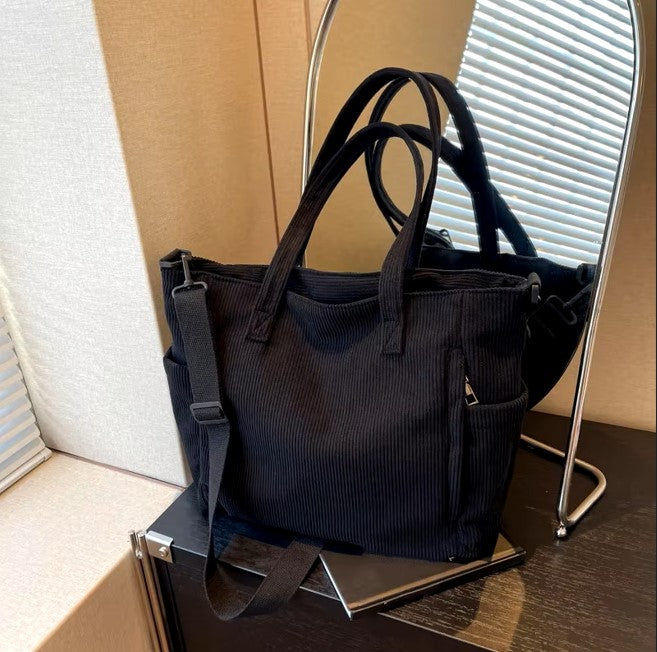 Sac à main rayé en velours côtelé
